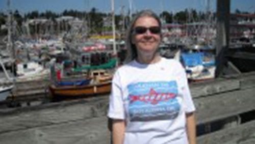 Delores Broten photographed in front of marina