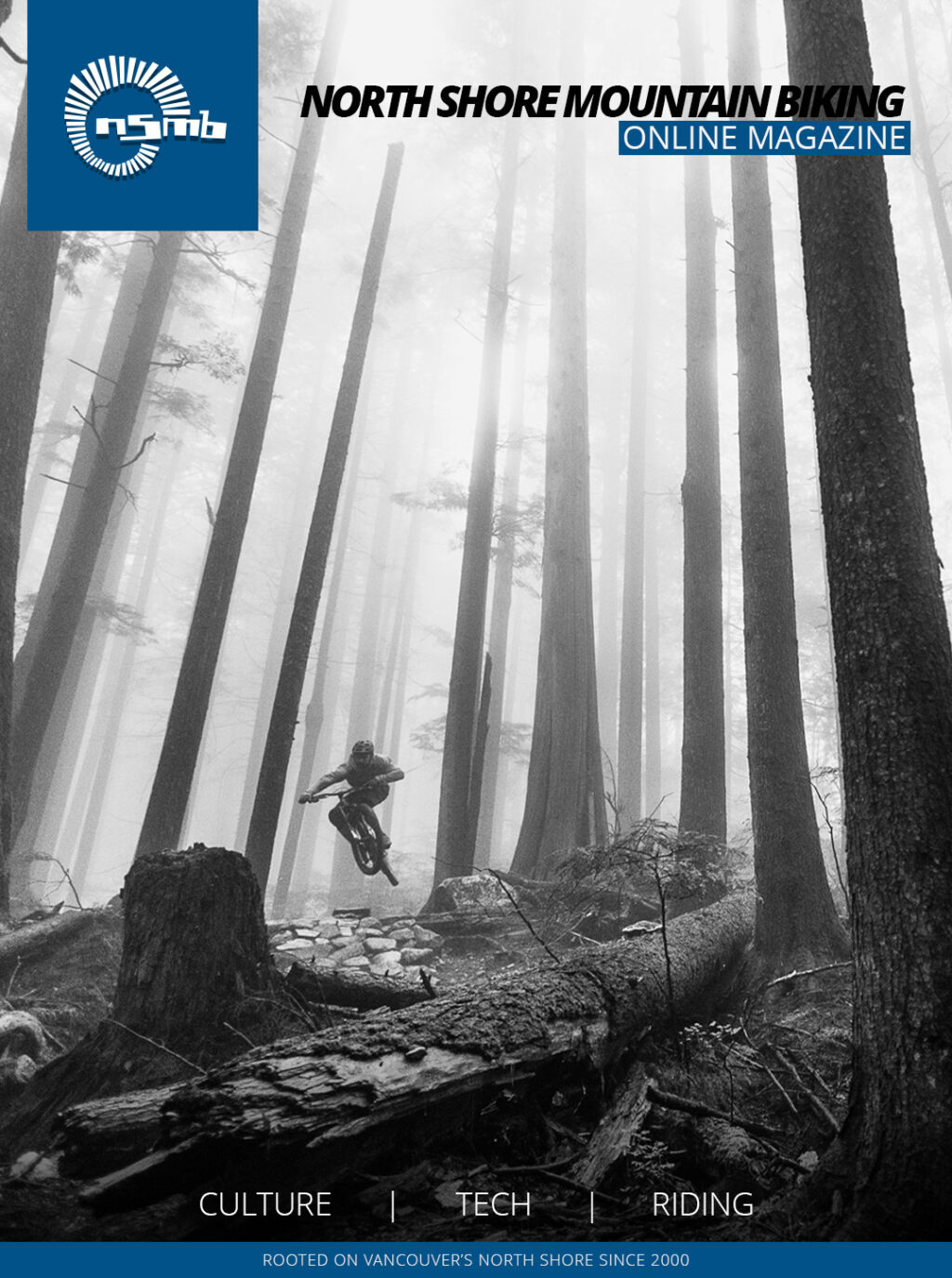 North Shore Mountain Biking (NSMB) Onlne Magazine cover 26.1 bike and biker leaping above rocks and logs in forest