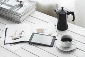 Open magazine plus stack coffee tablet white