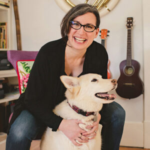 Kim Werker with cream-coloured dog by Studio Jeanie