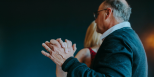 A mature man and woman dancing