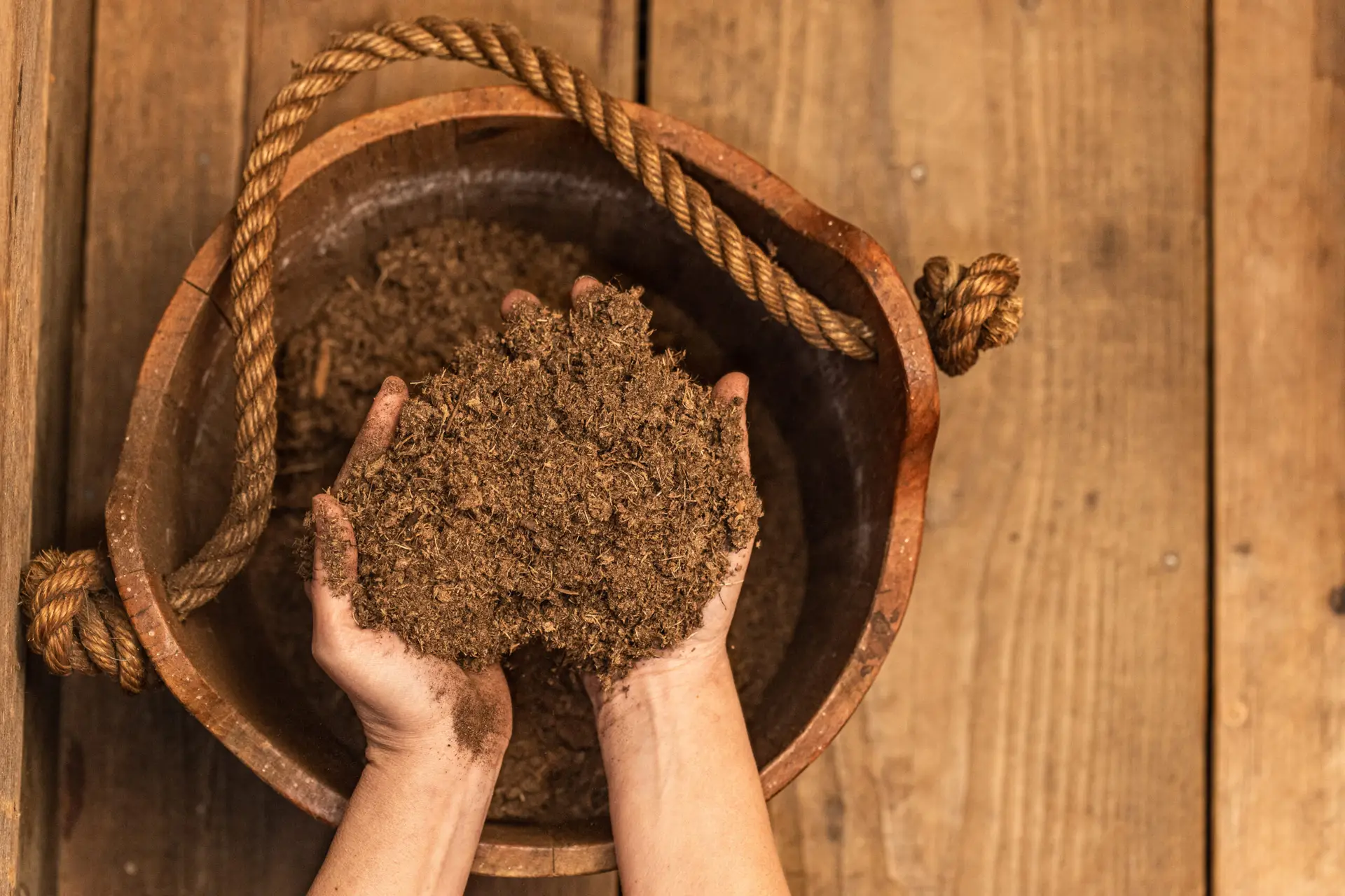Wooden bucket of fine wood chips