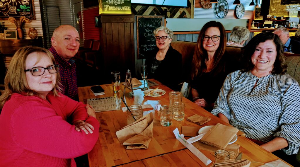 Richard Olafson and Carol Sokoloff of the Pacific Rim Review of Books, Jim Schneider of Island Parent, Carolyn Brandly of Dementia Connections, Fiona Bramble, L'Amour Lisik of The Malahat Review, Lise Gyorkos of Page One Publishing, and Barb Risto of Inspired 55+ Lifestyle Magazine at 10 Acres Commons, Victoria, May 17/22.