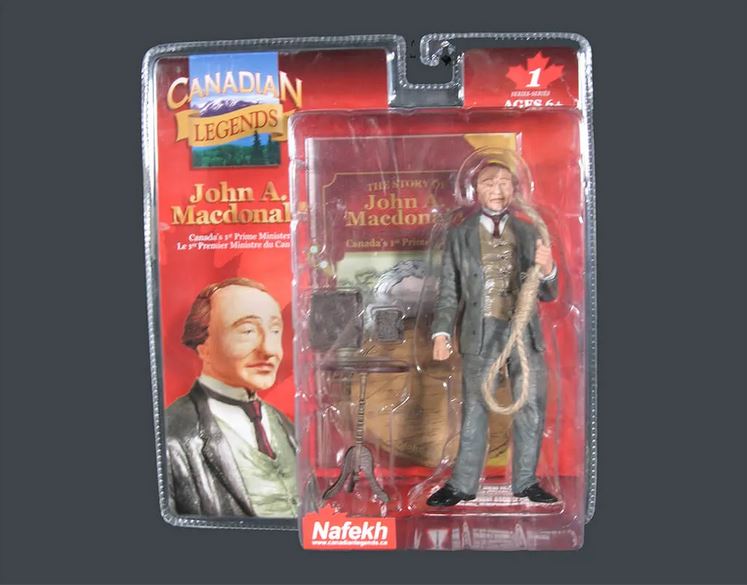 Altered found object of a figurine of John A. MacDonald with a rope encased in plastic