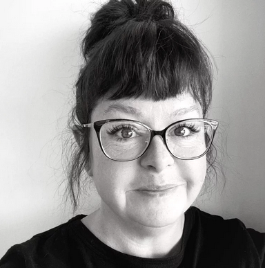 Black and white headshot of Angie McKaig